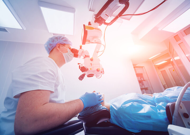 Ophthalmologist working on a patient.